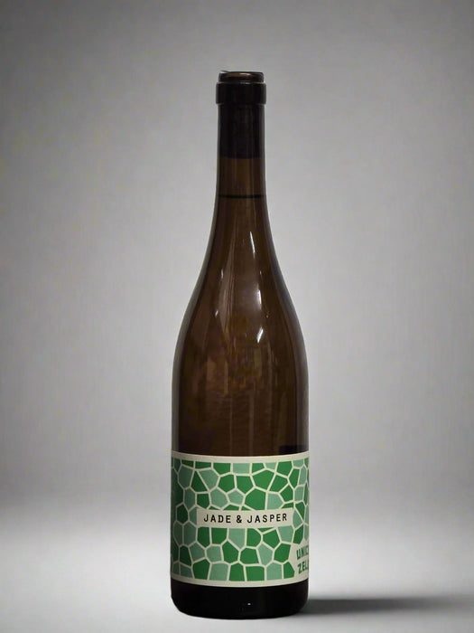 Wine bottle with a green label on a gray background